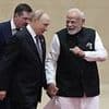 Trump rages as Putin and Indian prime minister Modi cozy up hand-in-hand at anti-NATO summit