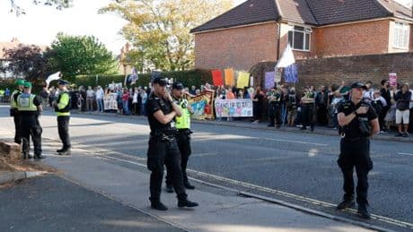 Manhunt after hotel with asylum seekers has flare shoved through window