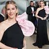 Ellie Goulding puts on an elegant display in striking black gown with dramatic pink bow as she steps out during Cannes Film Festival