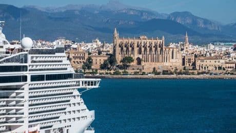 Chaos in Spain as 60,000 cruise ship tourists descend on island loved by Brits