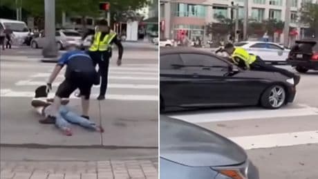 Shocking moment cop shoots driver through windscreen while clinging to car hood in Miami