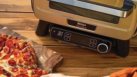 Ninja's electric outdoor pizza oven that comes with stand and cover has £76 off