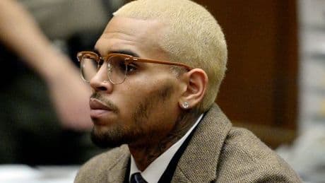 Chris Brown remanded in custody over alleged nightclub assault as trial date set