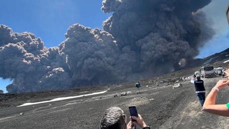 Mount Etna erupts sending tourists fleeing for lives as volcano explodes into life & smoke plume rises from mountain