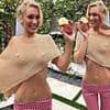 Bella Hadid goes braless under a semi-sheer cropped shawl as she launches latest perfume