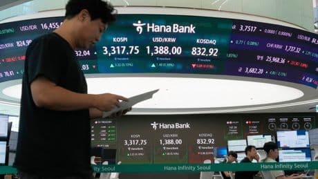 Asian shares are mostly up after US stocks inch to more records as inflation slows and Oracle soars