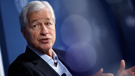 Inside the first week back at JPMorgan's largest US office, from the memos to the jockeying for desks
