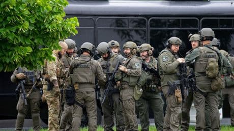 A Minnesota mayor says two state lawmakers were shot in their homes early Saturday