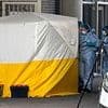 Man, 31, arrested on suspicion of murder after quadruple stabbing that killed two men at London business