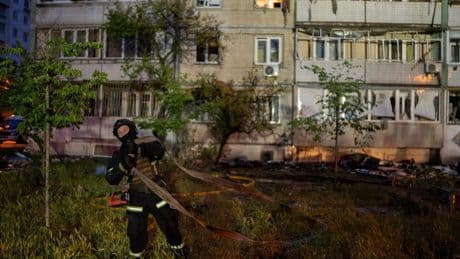 Emergency crews search Kyiv building after Russia strike injures 15