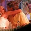 Body language expert claims Zara McDermott and new love Louis Tomlinson showed signs of 'boredom and awkwardness and a lack of synchronicity' when they kissed on Costa Rican holiday