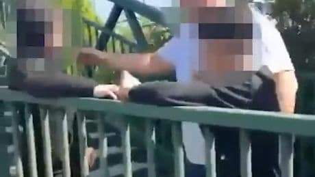 Horrific moment man holds schoolboy’s jumper while children beat him up in heinous broad-daylight assault