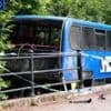Two seriously injured as bus carrying college students 'careers into river'