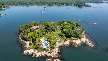 A Bridgewater exec is still trying to sell his private island. He cut its price &mdash; and threw in a mainland house with a dock.