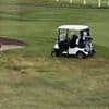 Fake America Great Again?! Moment Trump's golf caddy appears to surreptitiously drop ball in prize spot before president takes shot