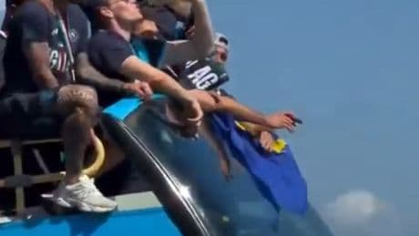Moment Scott McTominay swigs from whisky bottle thrown up by fan during wild Napoli celebrations