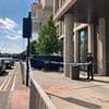 Tragedy as woman dies after 'falling from high rise building' in city centre - as police launch investigation