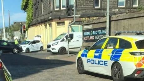Armed cops lockdown Edinburgh road and arrest man amid 'gangland crackdown'
