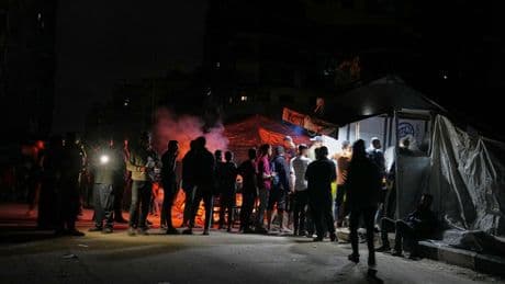 38 Palestinians killed in new shootings near food distribution centers, medics say