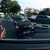 Horror as driver's car disappears dramatically into giant sinkhole