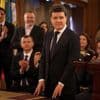 Romania's new president is sworn in as a political crisis eases, but challenges loom