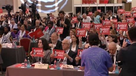 Sosyalist Enternasyonal'de 'Free İmamoğlu' pankartı: DEM Partili Hatimoğulları ve Temelli'nin  pankartı kaldırmaması dikkat çekti