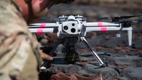 Video captures the US Army's first-ever test of grenade-dropping drones. They bombed vehicle targets.