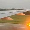 Terrifying moment engine bursts into flames on United Airlines passenger jet taking off for US from China - forcing flight to be abandoned