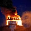 Burning of migrant boat effigy in Northern Ireland triggers police investigation