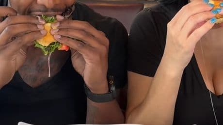 Food influencers narrowly escape death after car crashes into restaurant table mid-review