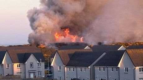 Huge wildfire breaks out near Scots homes as firefighters battle to contain blaze