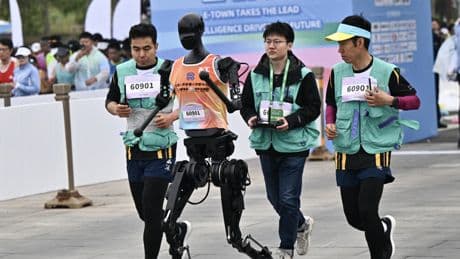 🌟The Bright Side: Robots race alongside humans in China half-marathon