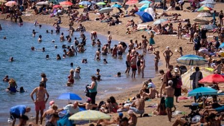 Spanish tourists forced to avoid their own beaches as holidaymakers flood seaside towns