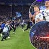 German fans STORM field in mass pitch-invasion with 'at least 25 hospitalised' after fallen giants secure Bundesliga return after seven years