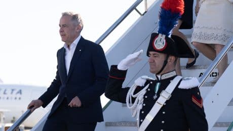Carney lands in Rome to attend Pope’s inaugural mass
