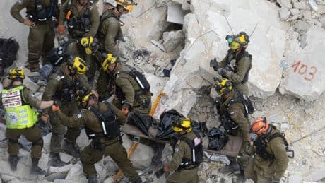 Watch: Rescuers search through Bat Yam rubble after Iran’s deadly attack