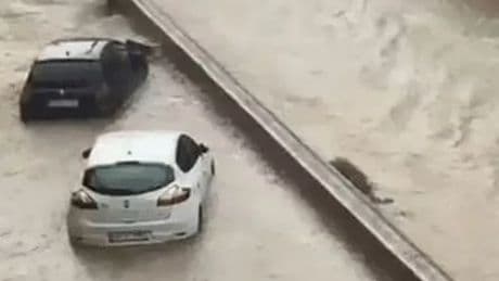 Spain hit by storm and hail warning as cars underwater after torrential rain