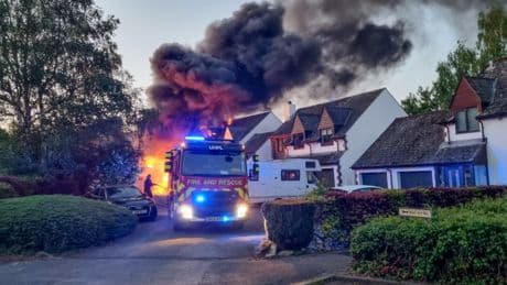 Electric car bursts into flames on driveway and destroys £550,000 family home