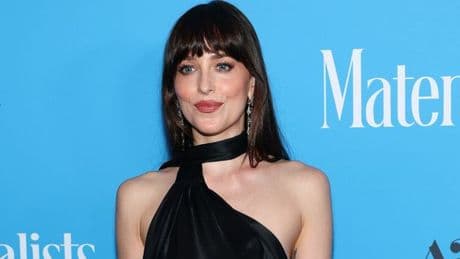 Dakota Johnson spotted 'kissing' her co-star after Chris Martin's shock on-stage message
