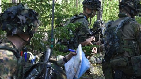 Finnish soldiers are going old school with paper maps so they're ready if an enemy shuts down GPS