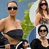 Kim Kardashian flashes her abs in a tiny bandeau top while Khloe wows in a leopard print catsuit as the famous family arrive in Venice for Jeff Bezos and Lauren Sanchez's $20M wedding