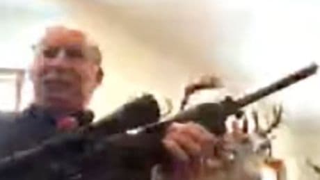 Pandemic-era lawsuit over gun at Michigan Zoom meeting is settled for $100,000
