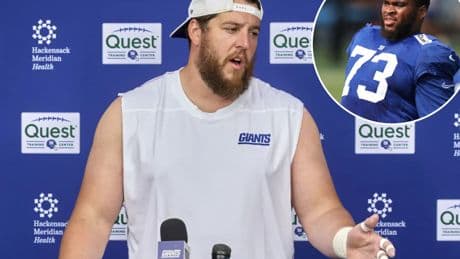 Greg Van Roten imparting wisdom on Evan Neal in awkward Giants position battle
