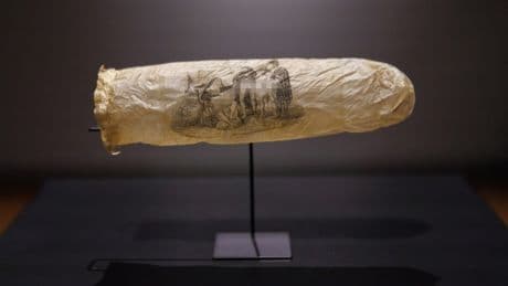 A 200-year-old condom with an erotic etching of a NUN and cheeky three-word French message revealed