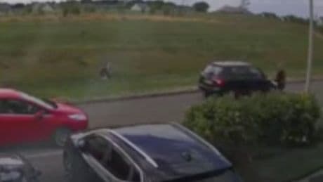 Moment driver nearly ploughed into group of children caught on camera