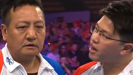 World Cup of Darts star confronted by own team-mate after horrific error at key moment