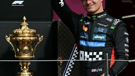 F1 star Lando Norris injured after fence COLLAPSES during British Grand Prix celebrations leaving him holding face