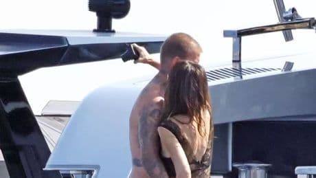 David Beckham grabs Victoria's bum on family yacht break as Nicola Peltz makes dig