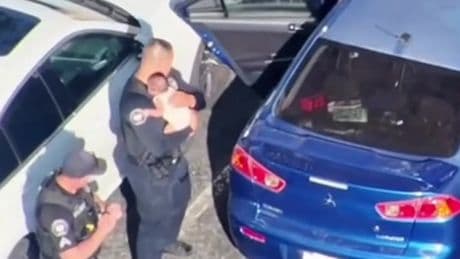 Watch: Police smash window to rescue baby locked in 110-degree car
