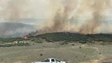 Prison evacuated as Colorado wildfire becomes one of the largest in state history